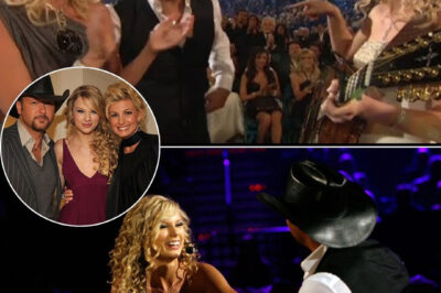 Watching Taylor Swift sing “Tim McGraw” in front of the man himself is a moment that feels almost surreal. Tim McGraw couldn’t hide his pride as he sat next to his wife, Faith Hill, watching the young artist who wrote this song when she was just 15 years old. The way Taylor points to Tim and whispers to the camera, “That’s Tim McGraw,” is beyond adorable, capturing a sweet moment of admiration and respect